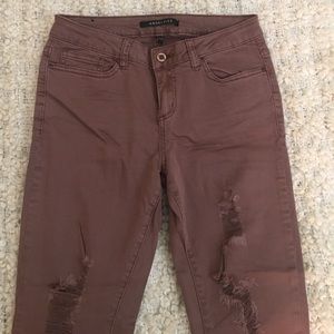 Blush wine distressed skinny jeans